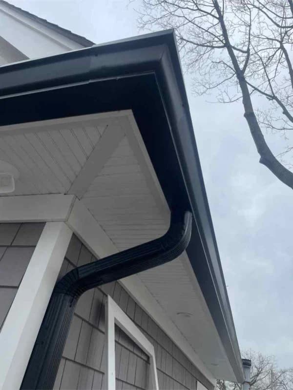 Black residential gutter installation