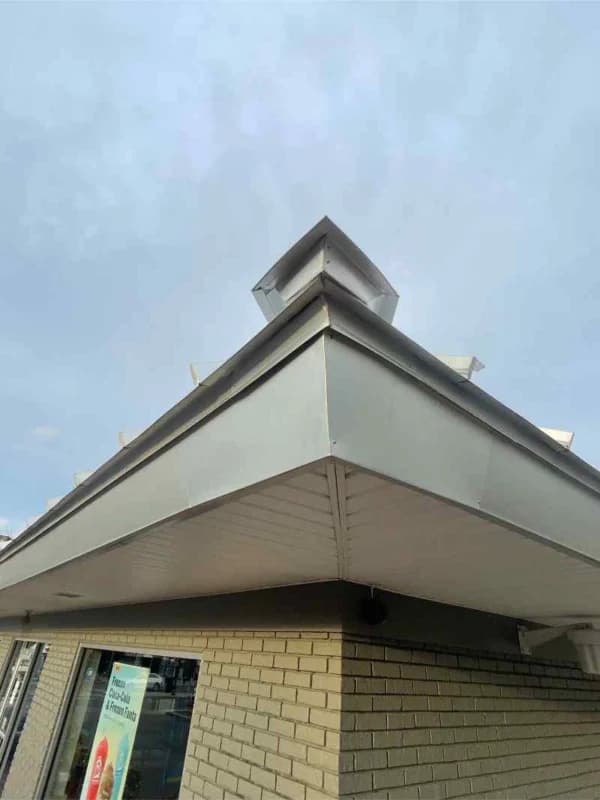 Commercial roof flashing installation