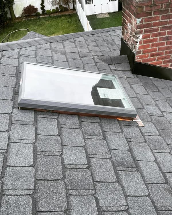 Shingle roof with skylight