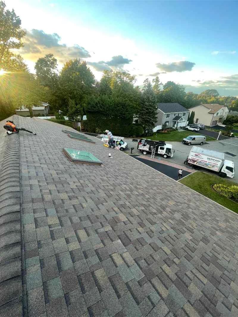 Completed shingle roof and skylight