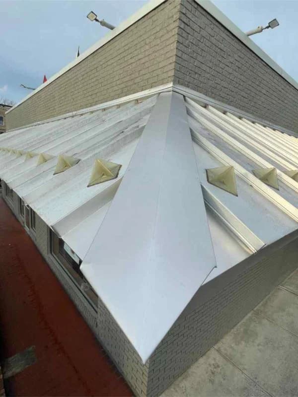 Standing seam metal roofing installation